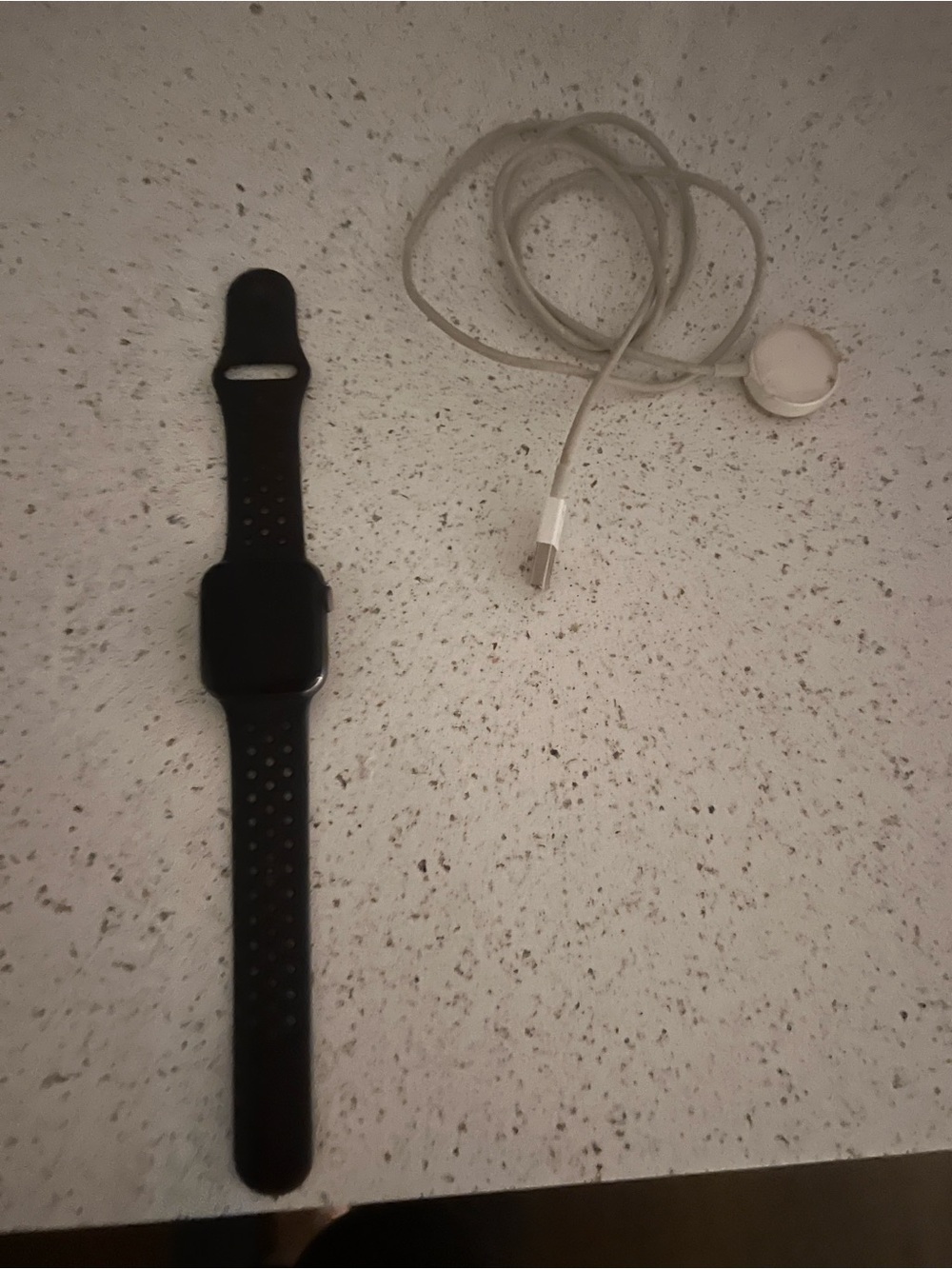 Apple Black Smartwatch with Black Perforated Sport Band and Charger
